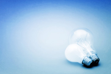 Image showing Background with lit lightbulb