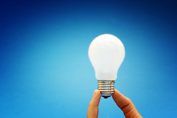 Image showing Background with lit lightbulb