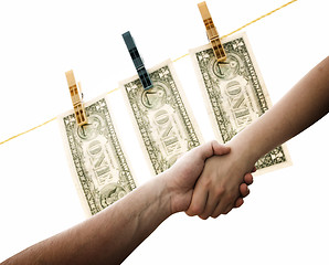 Image showing Dollars on the wire