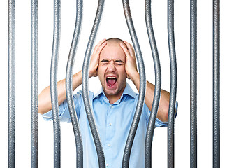 Image showing stressed prisoner and bended metal bar