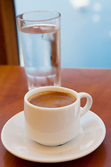 Image showing Greek coffee and a glass of water