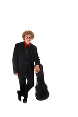 Image showing Guitar Player leaning on case
