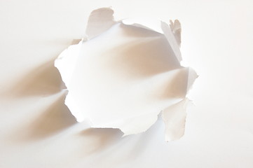 Image showing hole in paper