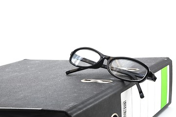 Image showing eye glasses and folder