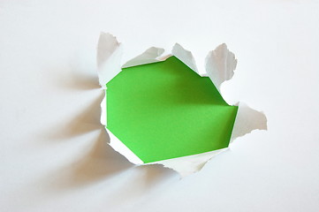 Image showing green hole in blank sheet paper