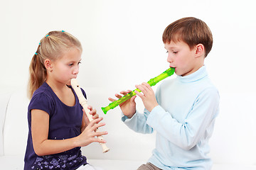 Image showing Kids playing flute