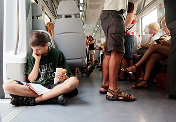 Image showing A passenger on a train