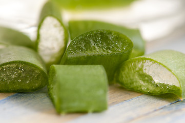 Image showing aloe vera juice with fresh leaves