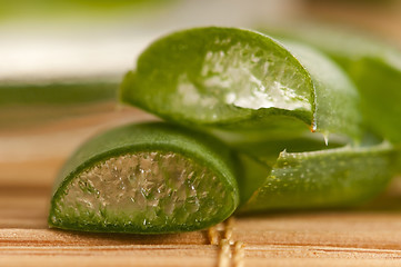 Image showing aloe vera juice with fresh leaves