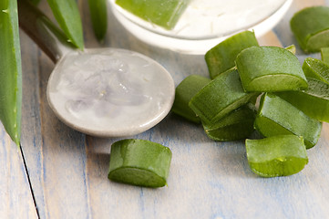 Image showing aloe vera juice with fresh leaves