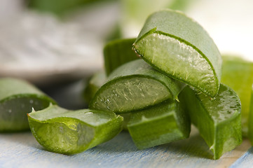 Image showing aloe vera juice with fresh leaves