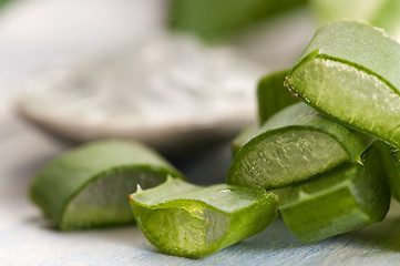 Image showing aloe vera juice with fresh leaves