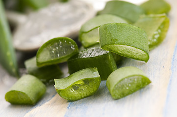 Image showing aloe vera juice with fresh leaves