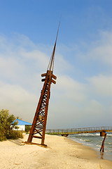 Image showing Metal tilted tower on the coast