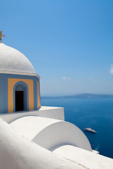 Image showing Old church dome and view of mediterranean sea in Santorini