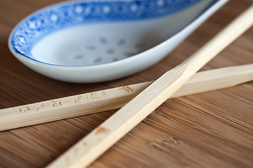 Image showing Chopsticks and Spoon