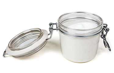 Image showing jar of cream with a steel lock
