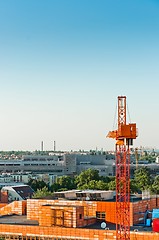 Image showing Construction sight with crane and buildings