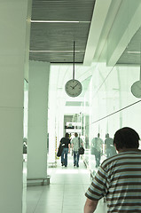 Image showing Passengers with luggage in the airport