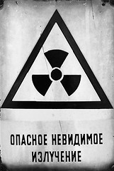 Image showing Russian Beware of radiation sign in metal
