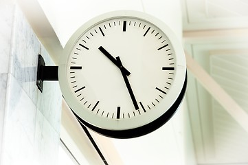 Image showing White clean clock showing the time
