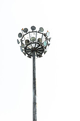 Image showing Many lamps on a post against white isolated background