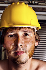 Image showing Worker in yellow helmet
