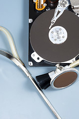 Image showing Computer hard drive and a stethoscope