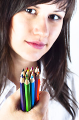 Image showing Student girl with colored pencils