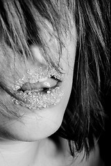 Image showing Girl with sugar on her lips