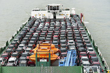 Image showing Boat carries a lot of cars to market