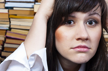 Image showing Young student girl with worried expression on her face