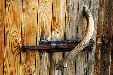 Image showing Foto of doorknob on old wood door