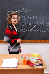 Image showing Serious math teacher explaining