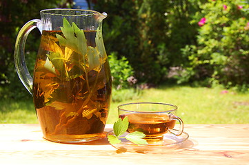 Image showing cup of tea in the garden