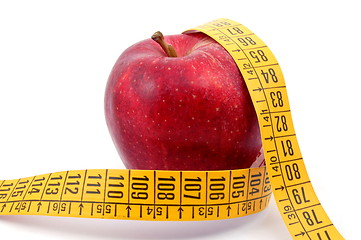 Image showing Apple and measuring tape on white