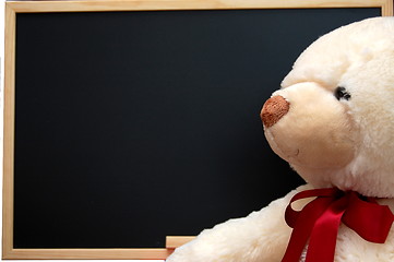 Image showing teddy with empty blackboard