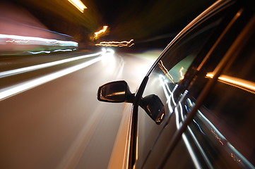 Image showing night drive with car in motion 