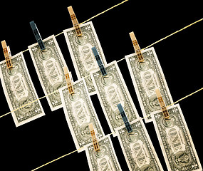 Image showing Dollars on the wire