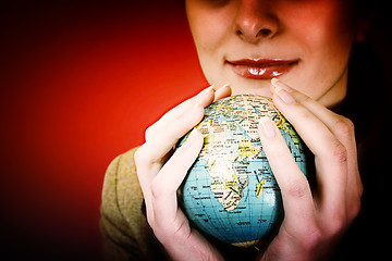 Image showing Globe in a girl's hands