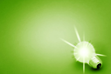 Image showing Background with lit lightbulb