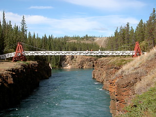 Image showing Suspension bridge spanning Miles Canyon & River. Yukon, Canada