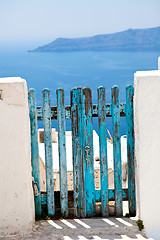 Image showing Old wooden gate in Santorini