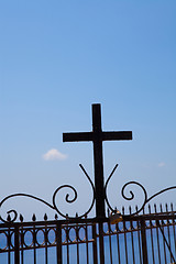 Image showing Metal cross on a fence in Thira, Santorini, Greece