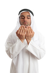 Image showing Arab man with open palms praying