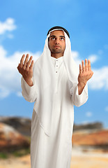 Image showing Middle eastern arab man with arms outstretched