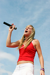 Image showing Singer hits the high notes