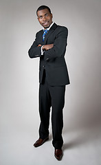 Image showing African American businessman with his arms crossed