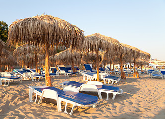 Image showing beach with umbrellas and chairs