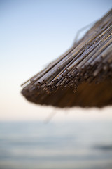 Image showing umbrella on sea background